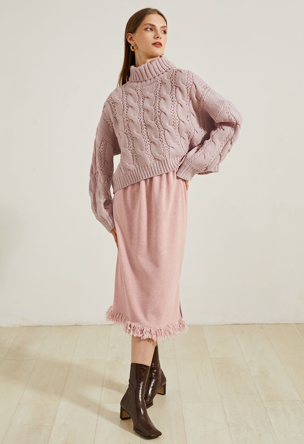 Rollkragenpullover mit geflochtenem Strick in Pink