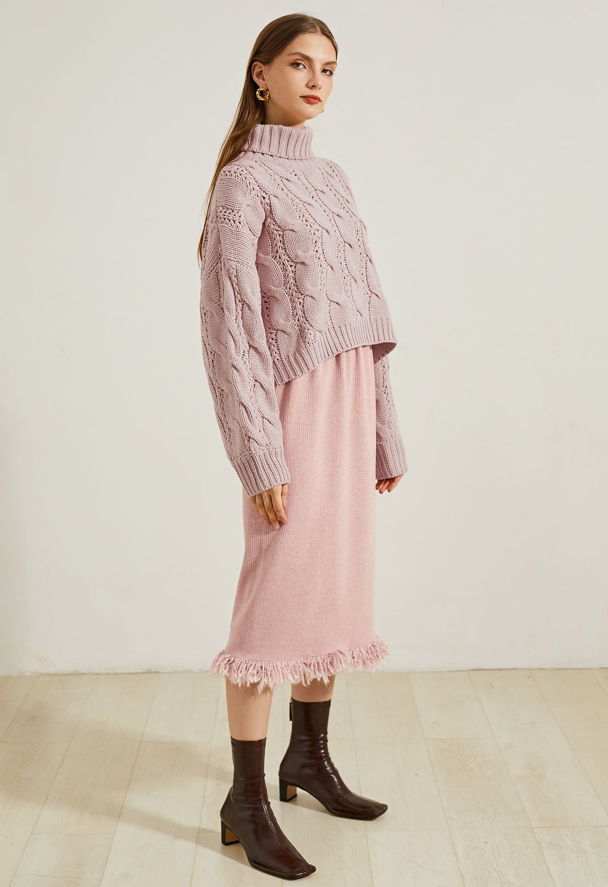 Rollkragenpullover mit geflochtenem Strick in Pink