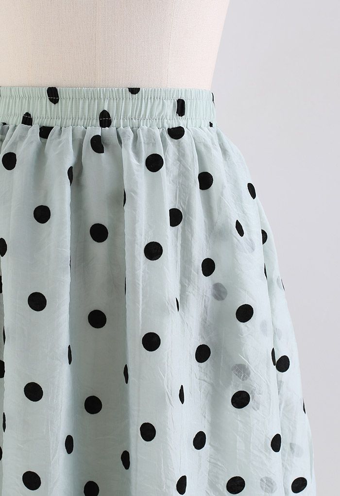 Transparenter Midirock mit schwarzen Polka Dots in Minze