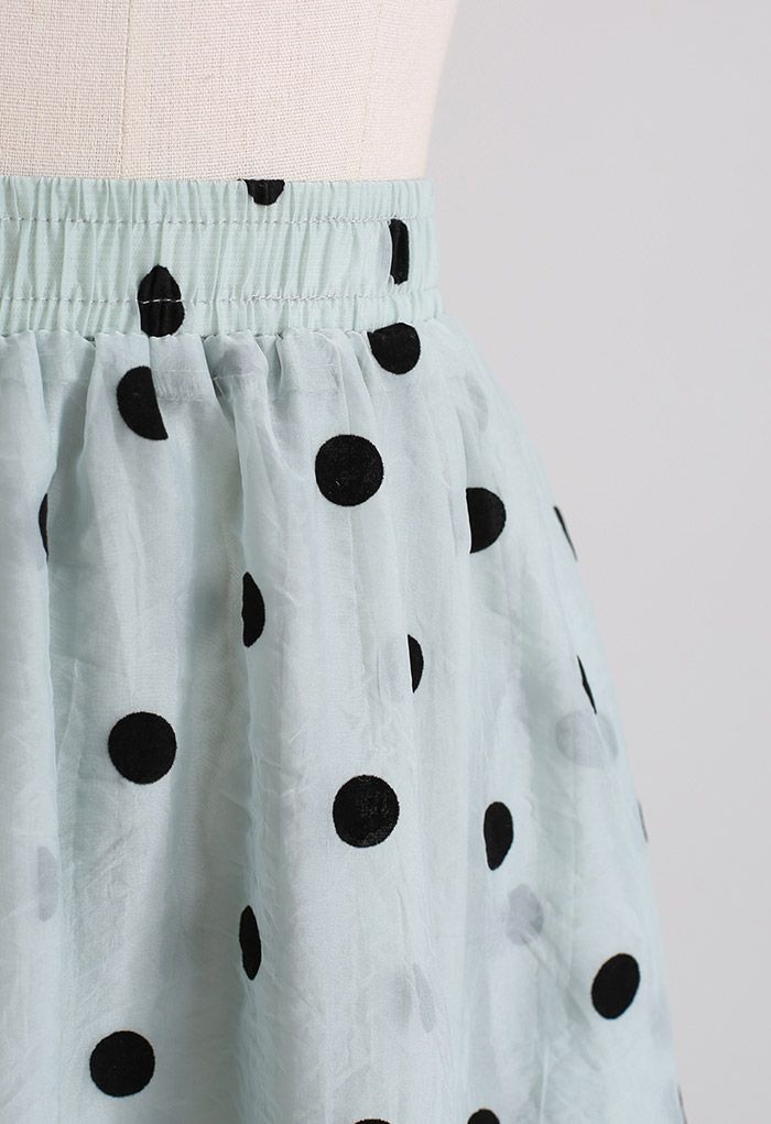 Transparenter Midirock mit schwarzen Polka Dots in Minze