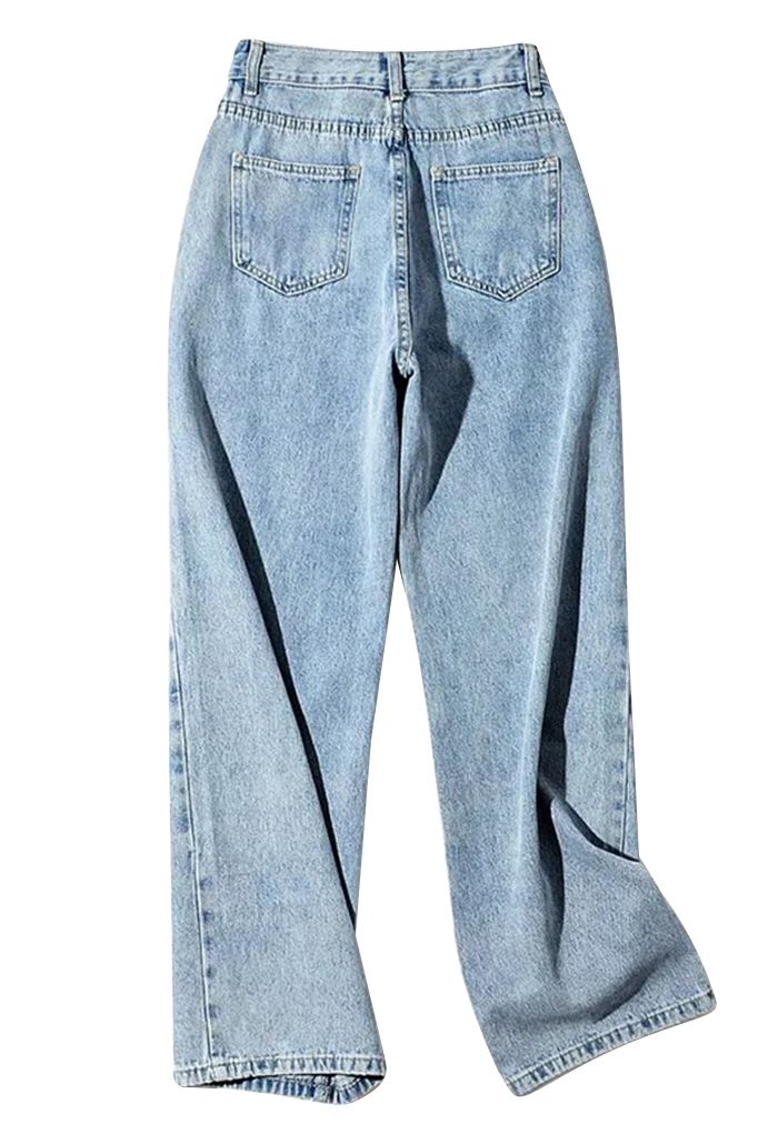 Weite Jeans mit seitlichen Knöpfen in Blau