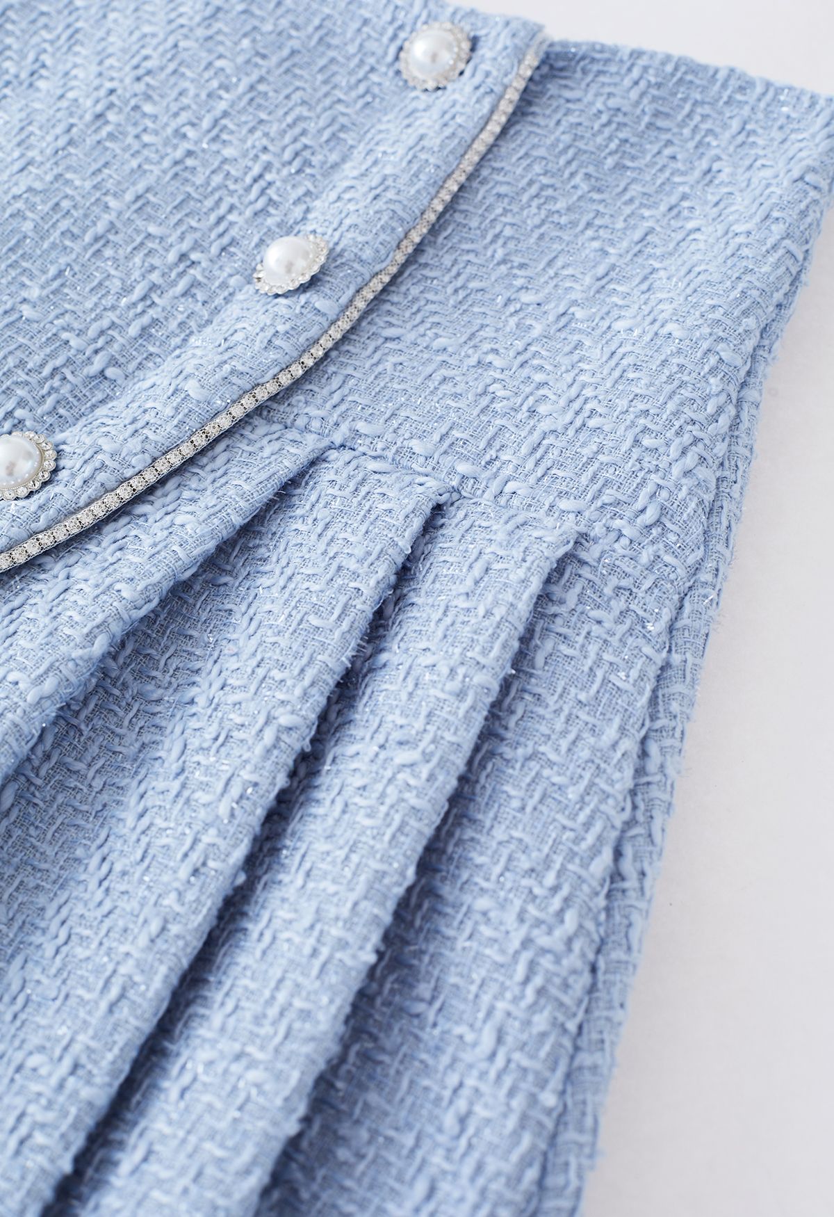 Zweireihiger, plissierter Tweed-Minirock in Blau