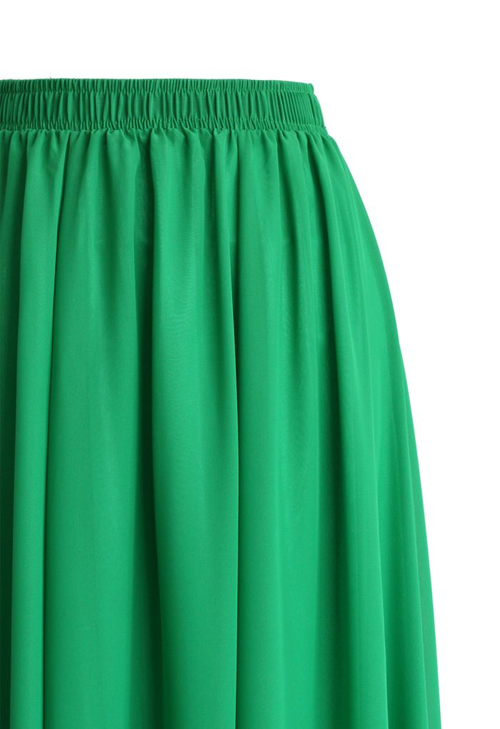 Langes Kleid aus smaragdgrünem Chiffon